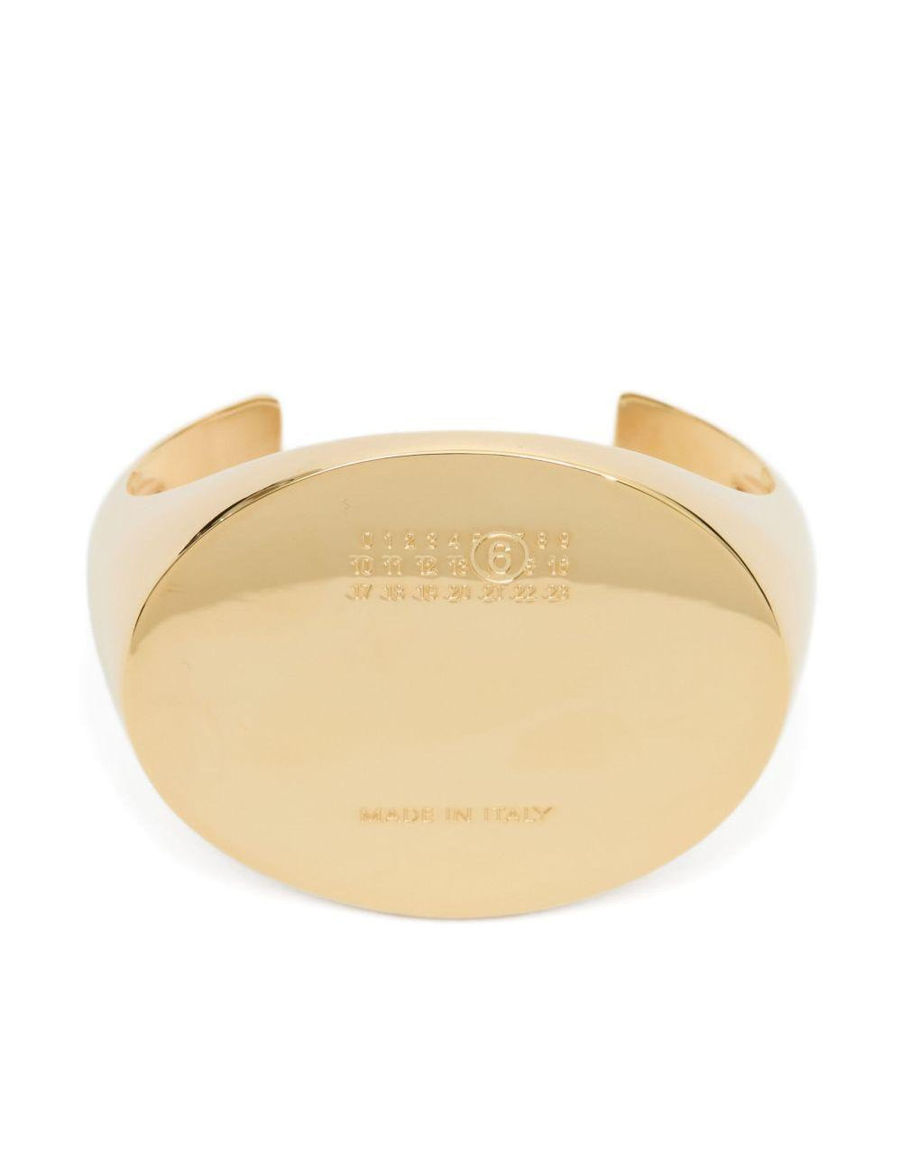 Bracciale con logo inciso in oro Mm6 maison margiela - donna 