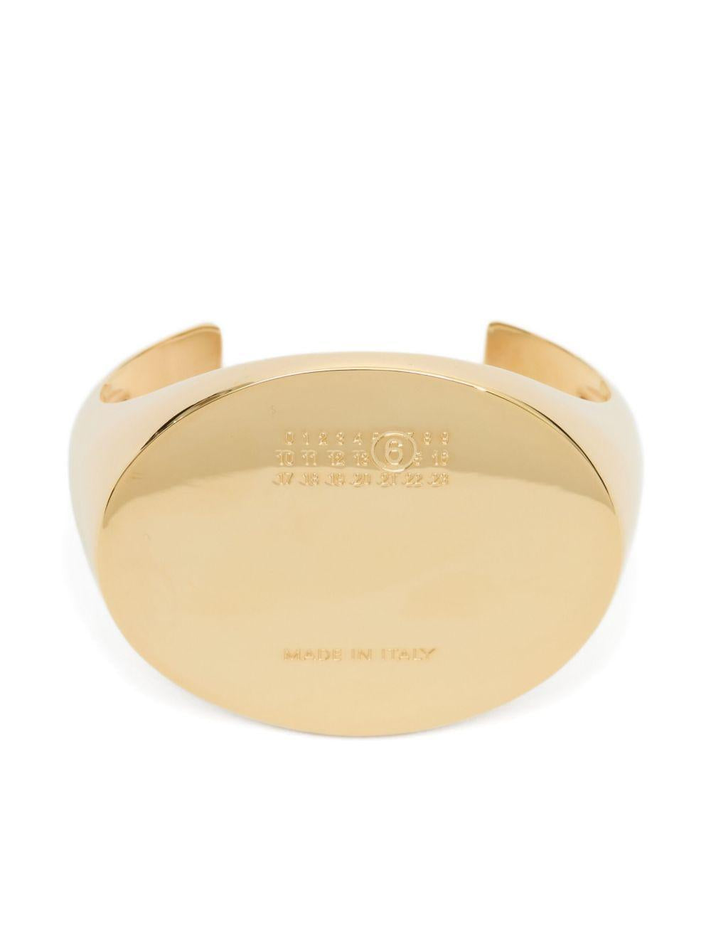 Bracciale con logo inciso in oro Mm6 maison margiela - donna 
