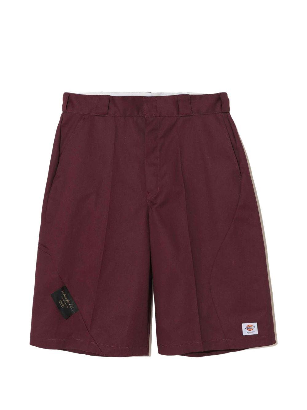 Shorts con logo in bordeaux Undercover - uomo 