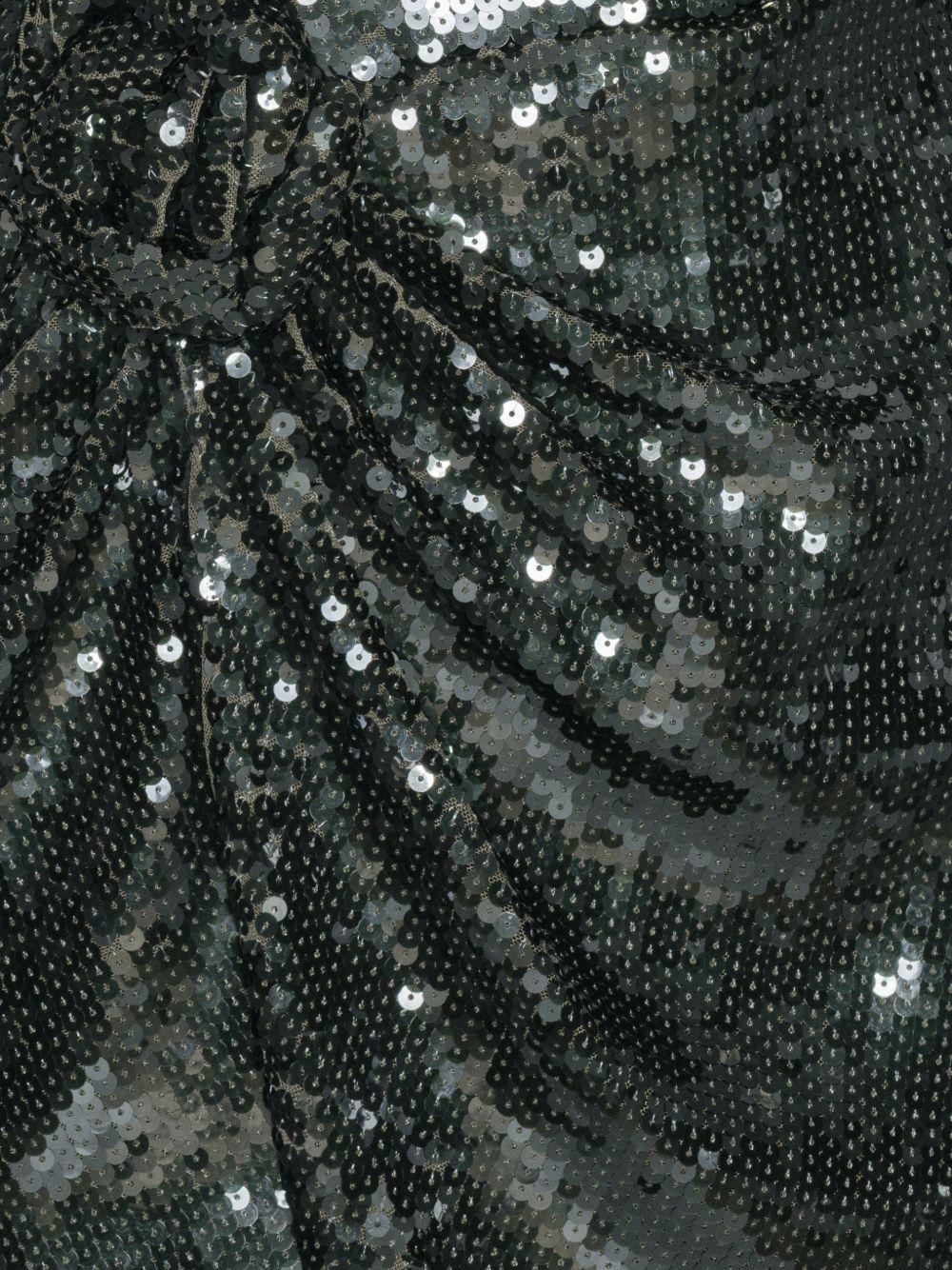 Abito corto con paillettes in verde 