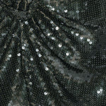 Abito corto con paillettes in verde 