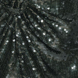 Abito corto con paillettes in verde 