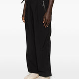 Pantaloni con tasche in nero and Wander - uomo 