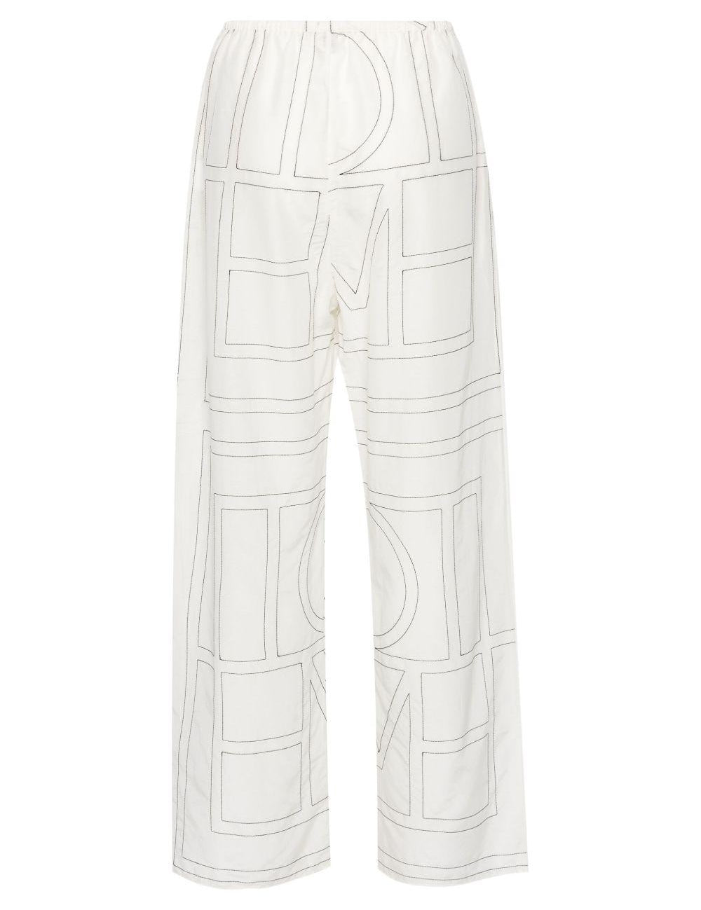 Pantaloni con monogramma ricamato in bianco Toteme - donna 