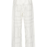 Pantaloni con monogramma ricamato in bianco Toteme - donna 