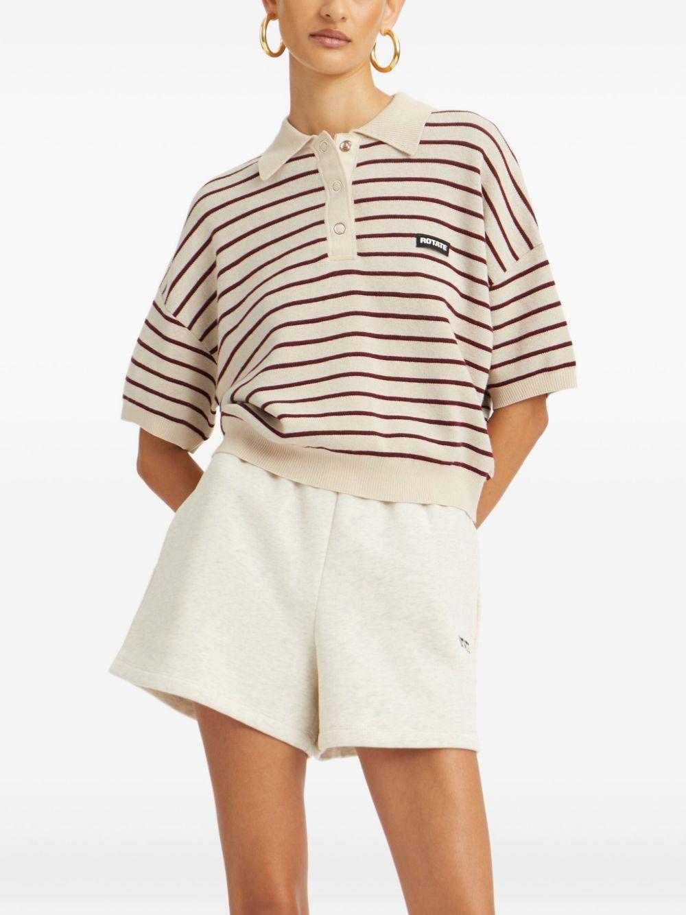Polo con logo a righe in beige 