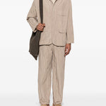 Pantaloni con vita elasticizzata in beige Gongdid design - uomo 