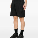 Shorts con vita elasticata in nero Oakley- uomo 