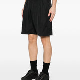 Shorts con vita elasticata in nero Oakley- uomo 