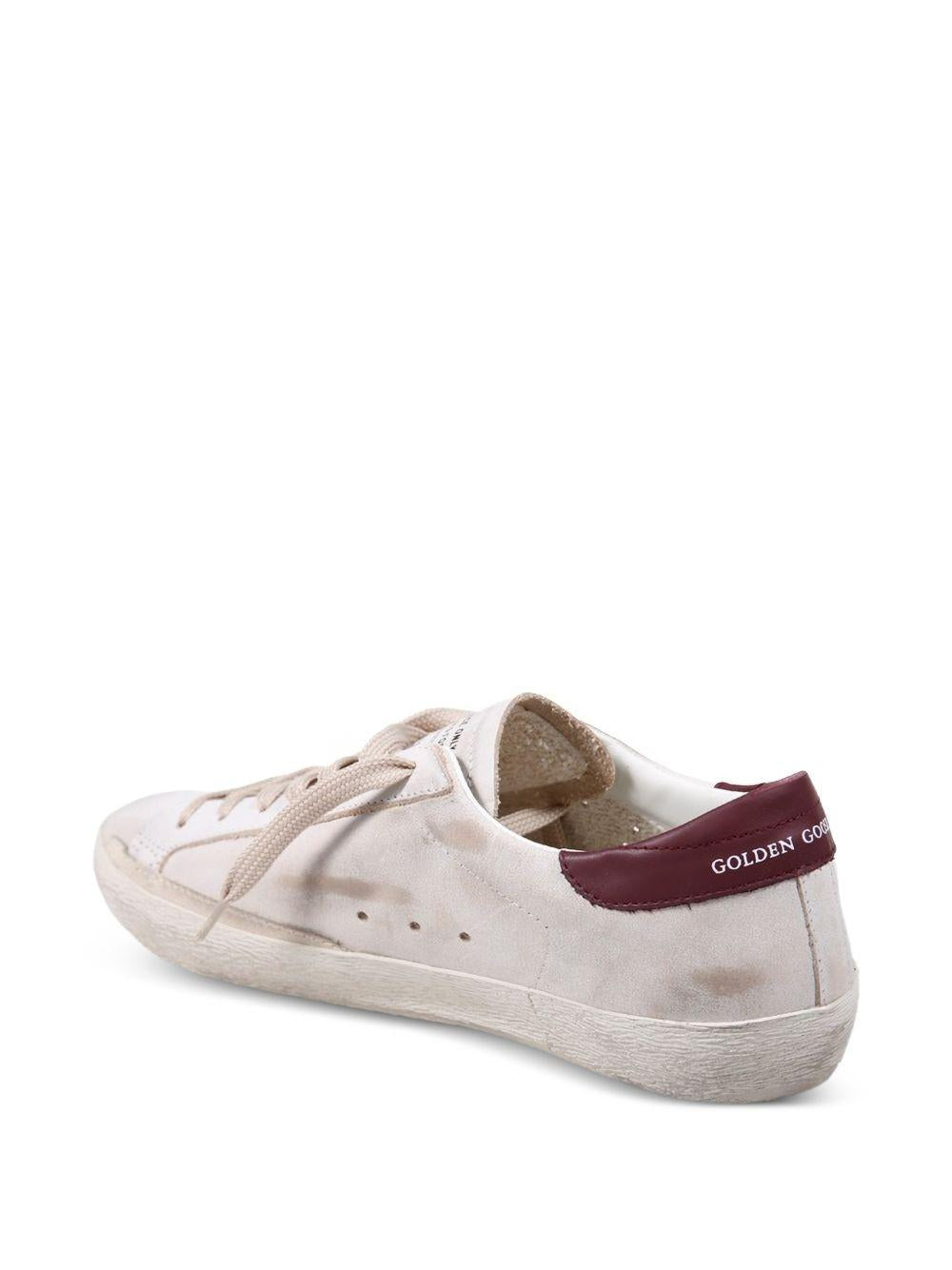 Sneakers Superstar in avorio e bordeaux Golden goose - uomo 