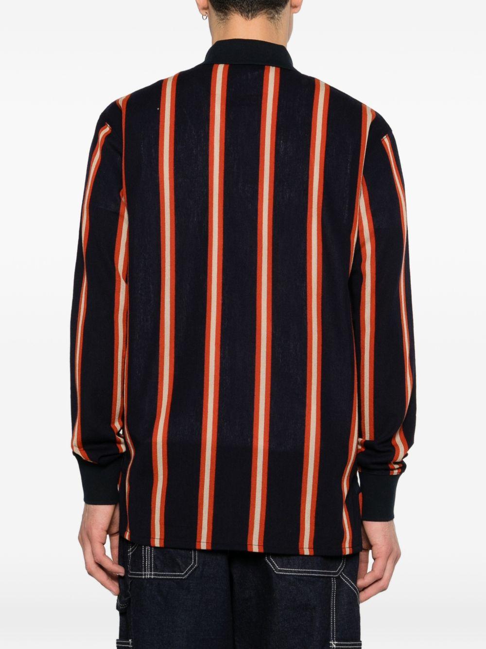 Polo a maniche lunghe a righe in nero Junya watanabe - uomo 