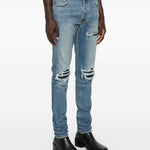 Jeans con strappi in blu 