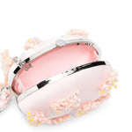 Clutch in raso rosa con decorazioni floreali 