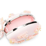 Clutch in raso rosa con decorazioni floreali 