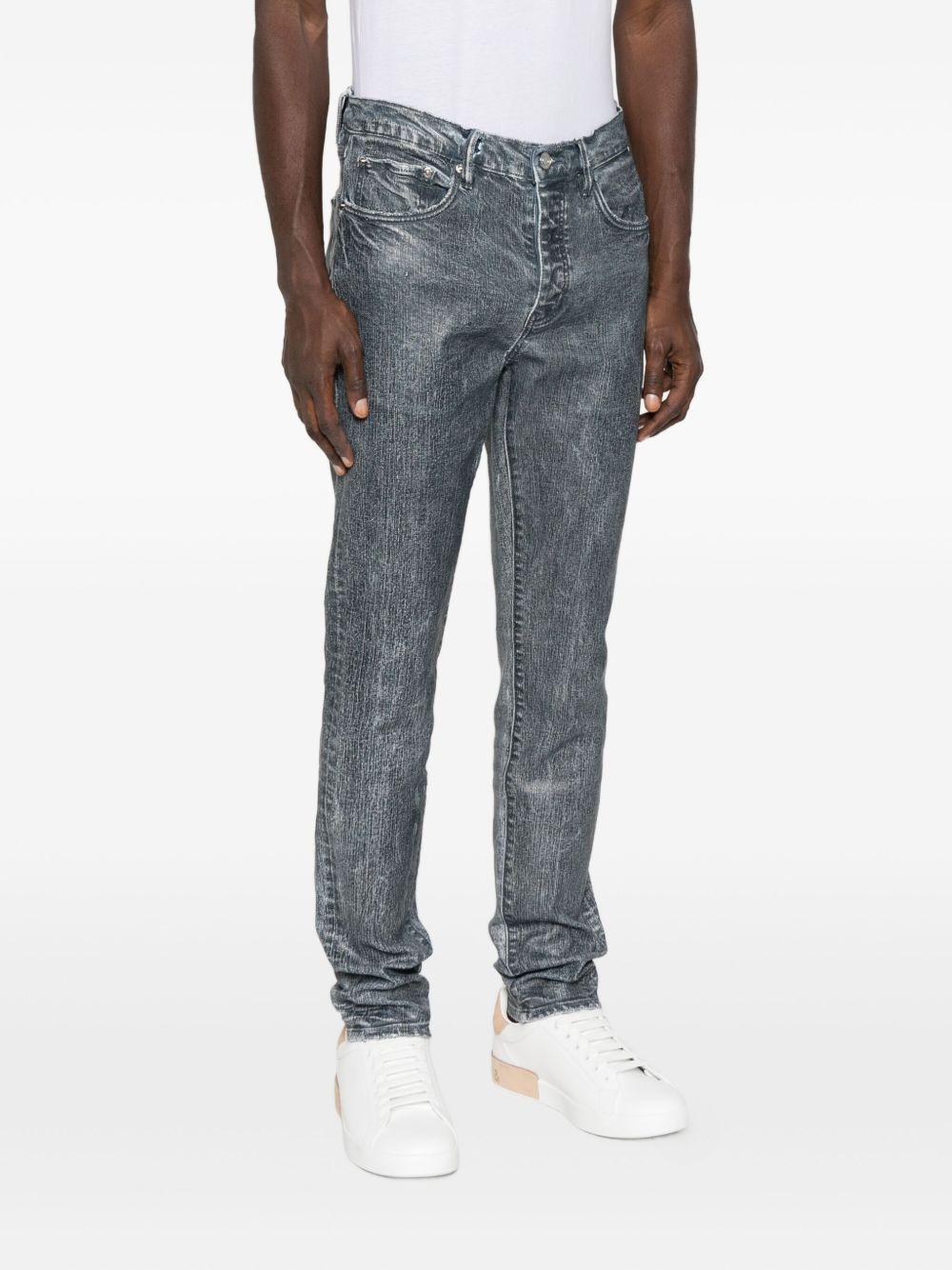 Jeans con lavaggio acido in blu Purple - uomo 