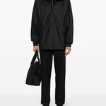 Parka rivestito con cappuccio e coulisse  in nero Rains - uomo 