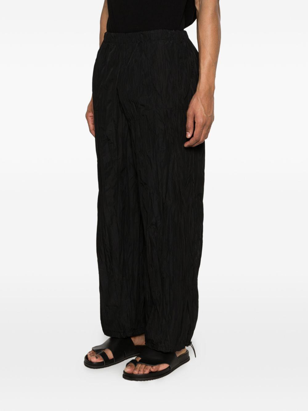 pantaloni plissettati in nero gongdid design - uomo 