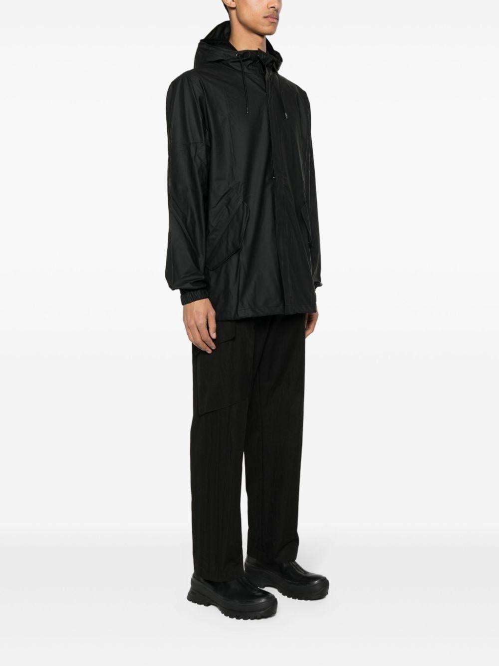 Parka rivestito con cappuccio e coulisse  in nero Rains - uomo 