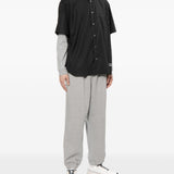 Camicia con logo ricamato in nero COMME DES GARCONS HOMME - uomo 