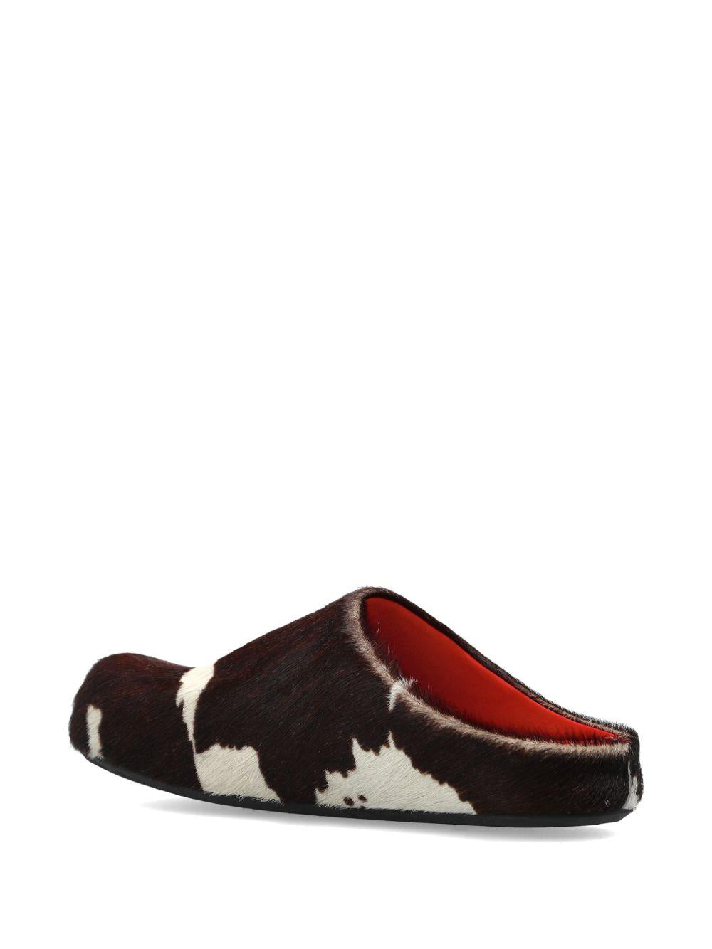 Mules fussbett con stampa mucca in bianco e marrone 