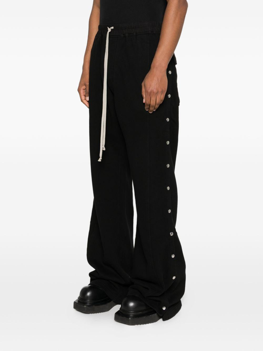 Pantaloni flared con coulisse in nero Rick owens drkshdw - uomo 