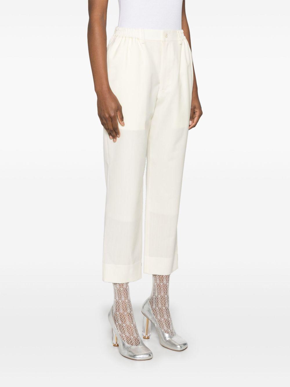Pantaloni affusolati in bianco Comme Des Garçons - donna 
