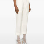 Pantaloni affusolati in bianco Comme Des Garçons - donna 