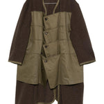 Cappotto con design a pannelli in verde Comme des garcons homme - uomo 