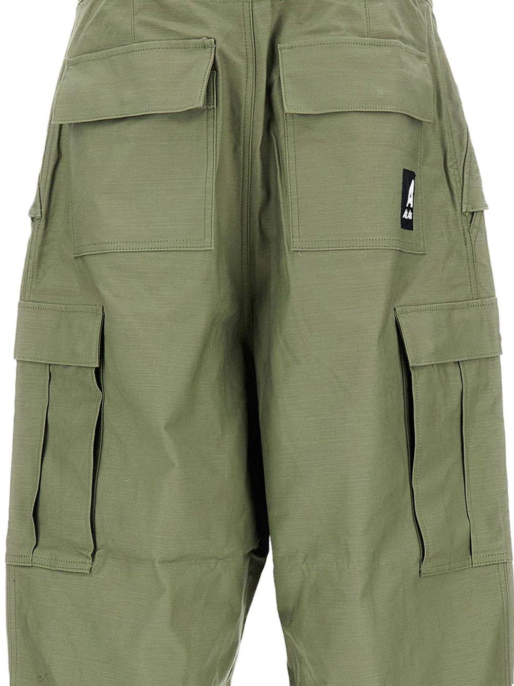 Pantaloni con tasche cargo in verde Junya watanabe - uomo 