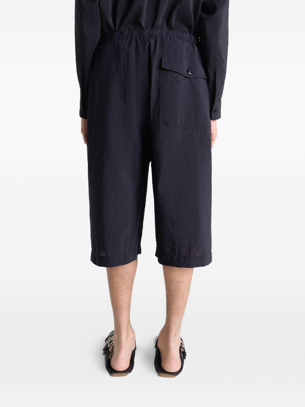 Shorts cargo con coulisse in nero Lemaire - uomo 