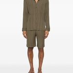 Pantaloncini elasticizzati con pieghe in verde Gongdid design - uomo 