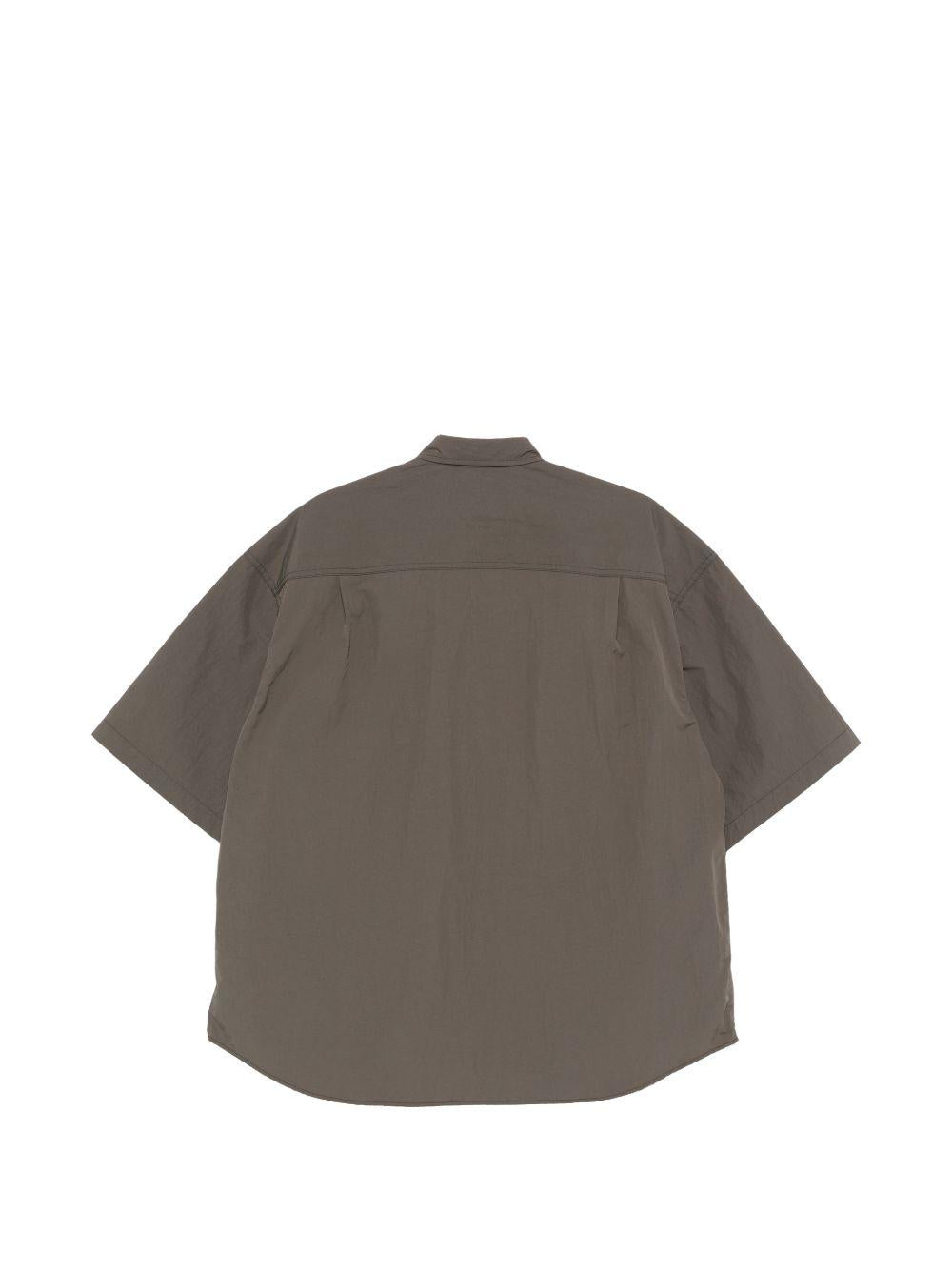 Camicia a maniche corte con patch logo in verde Comme des garcons homme - uomo 