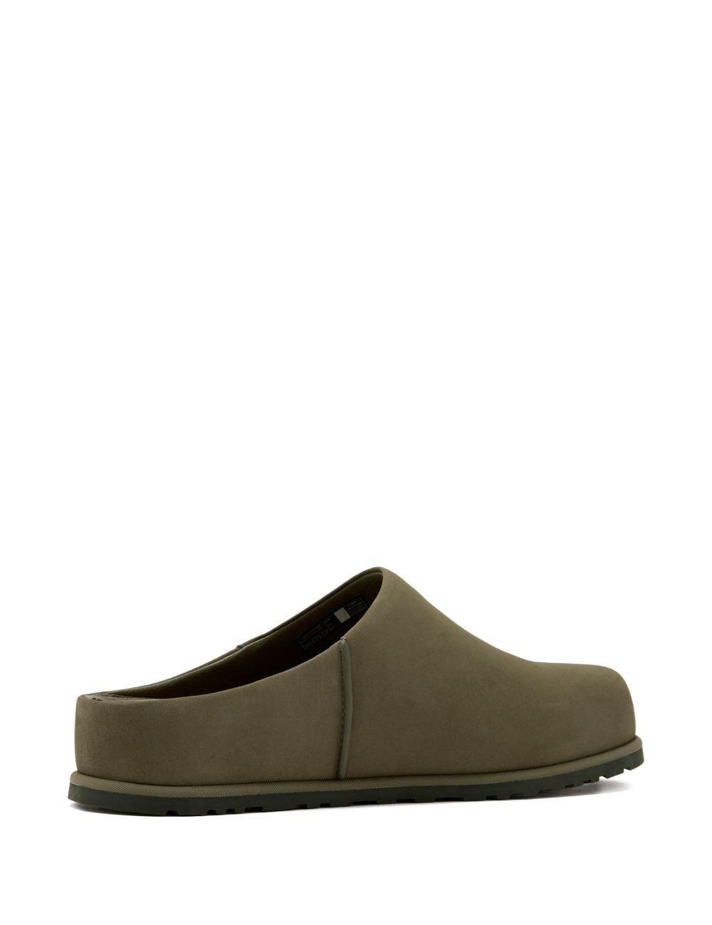 Mules Otzo in verde Ugg - uomo 