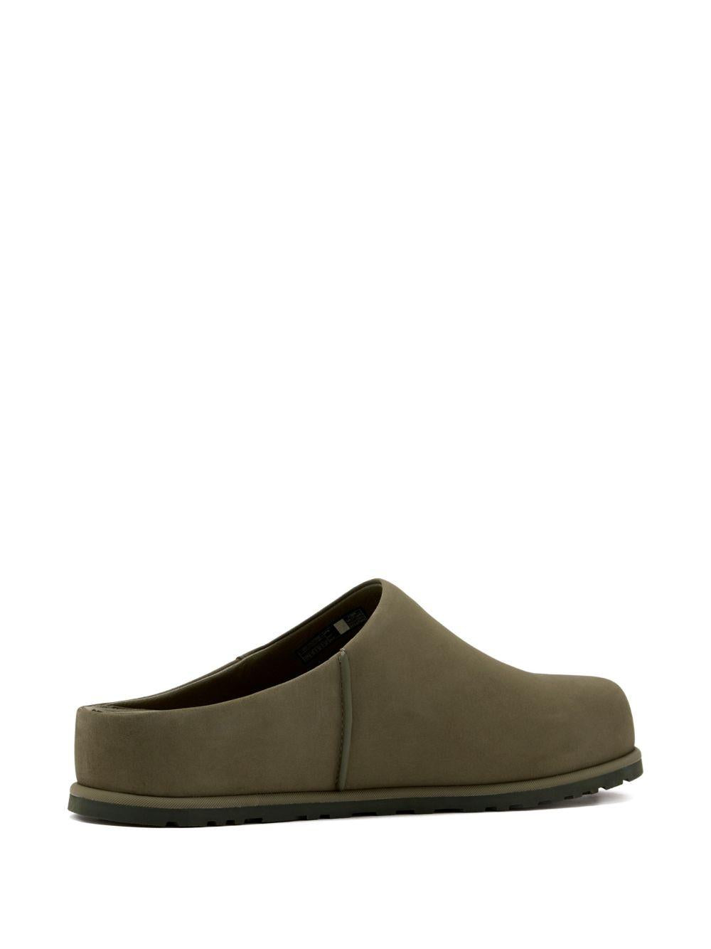 Mules Otzo in verde Ugg - uomo 