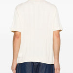 Polo con logo in bianco Kidsuper - uomo 