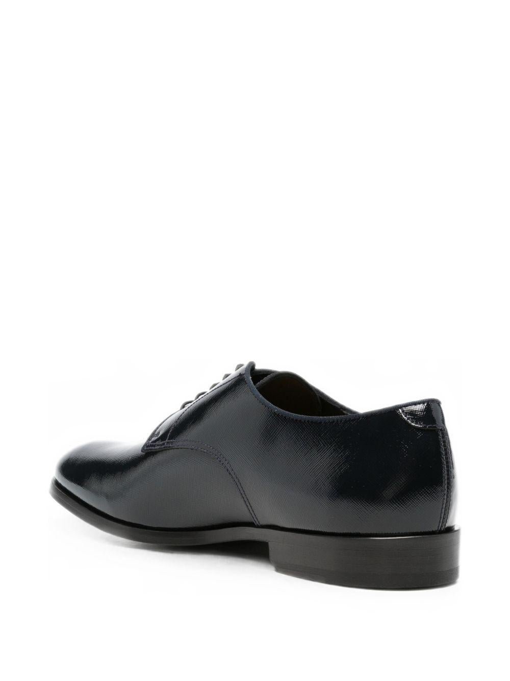Derby in pelle in nero 