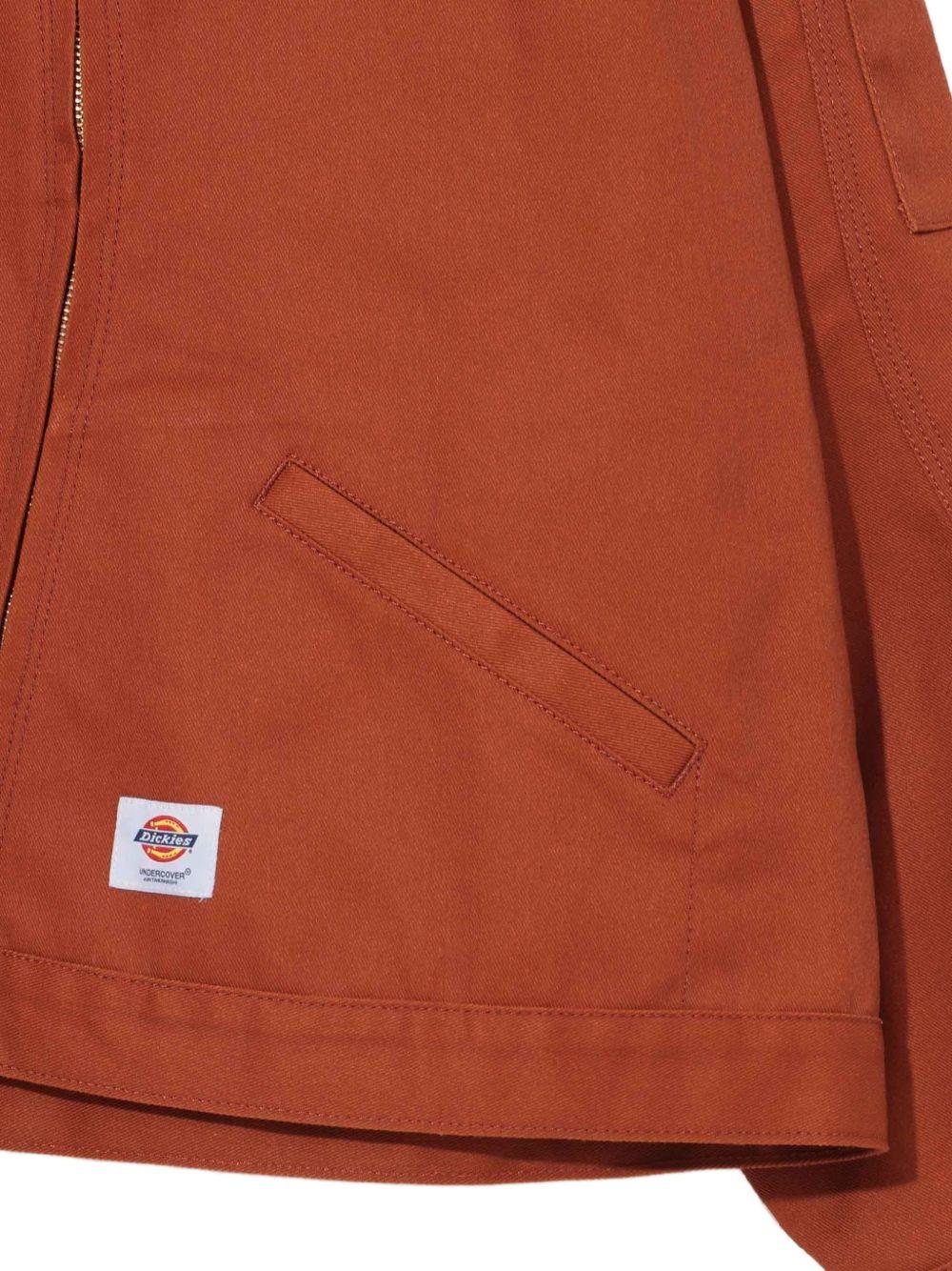 Giacca con zip in arancione Undercover - uomo 