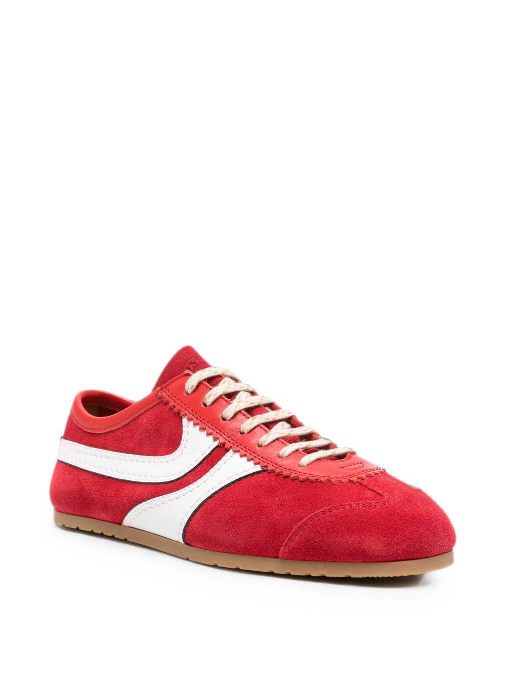 Sneakers a pannelli in pelle in rosso 