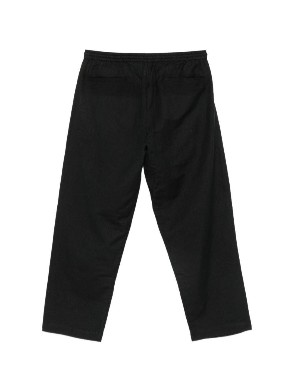 Pantaloni con coulisse e ricamo di uccelli in nero Baziszt - uomo 