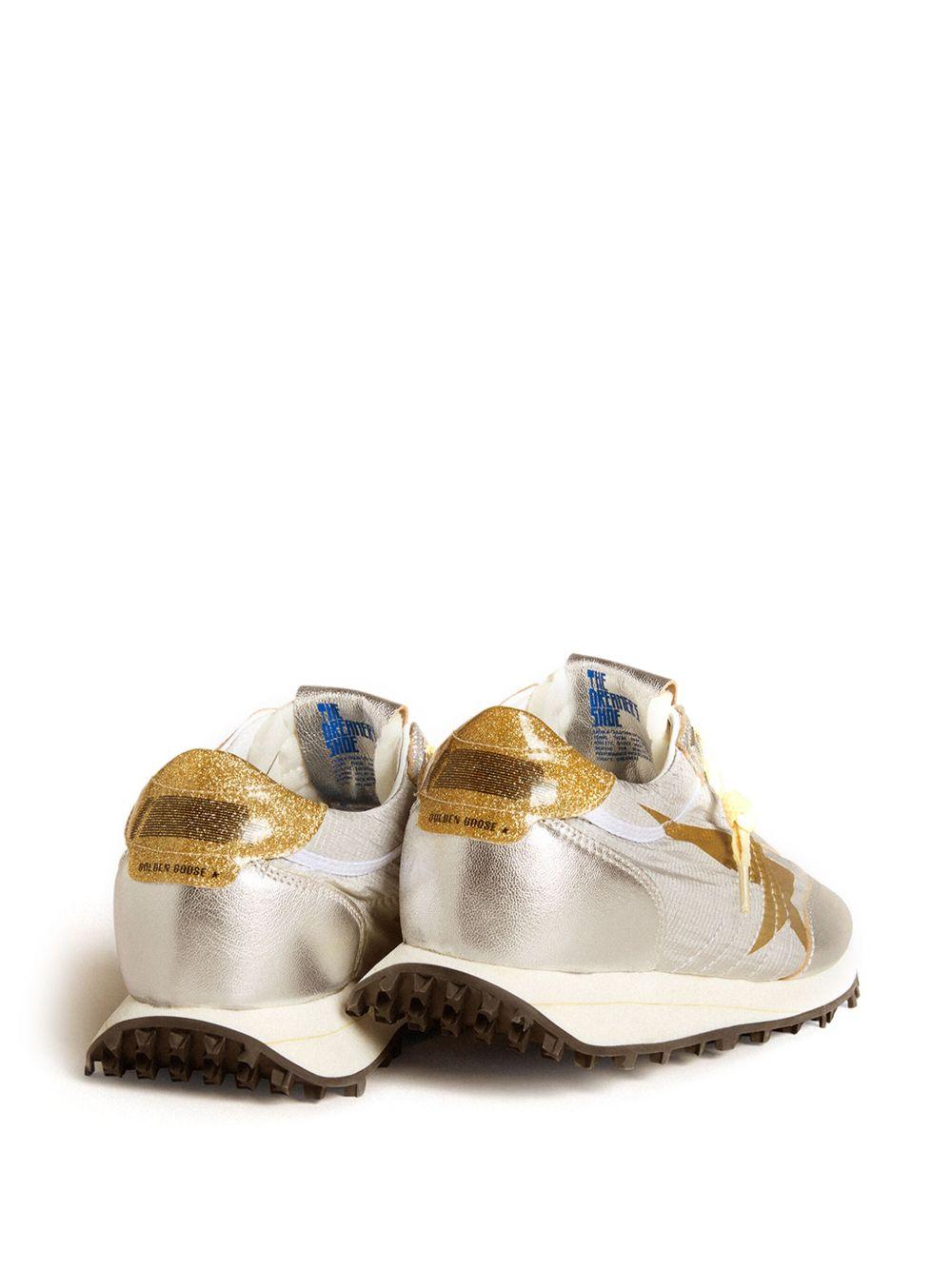 Sneakers a stelle con glitter in argento e oro di Golden goose - donna 