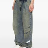 Jeans con pieghe in blu Pdf - uomo 