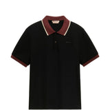 Polo con colletto a contrasto in nero e marrone 