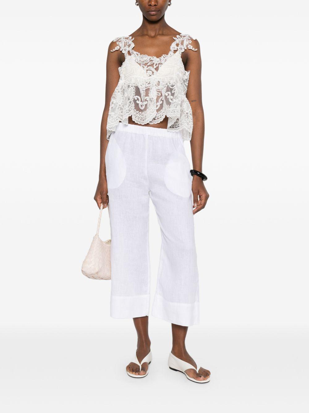 Top con lacci in pizzo in bianco Maurizio - donna 