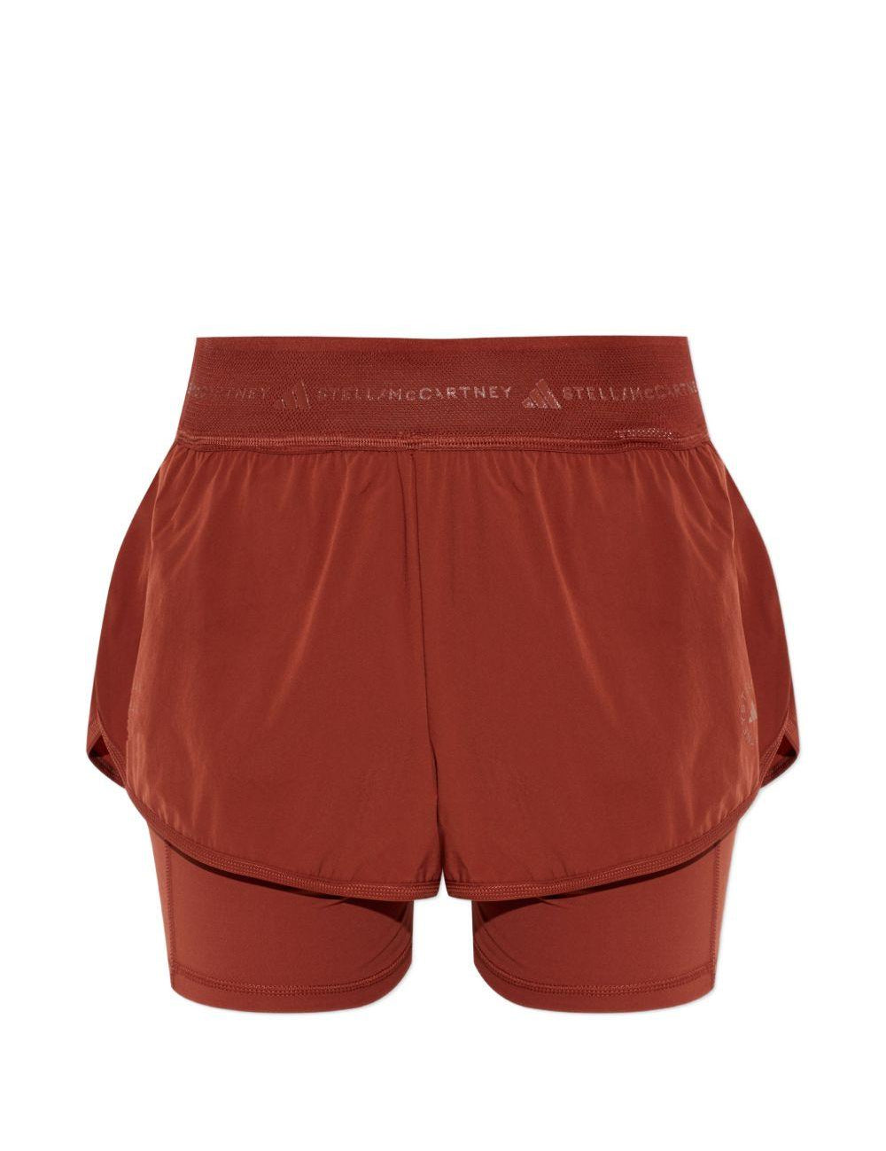 Shorts 2 in 1 con logo in rosso terracotta Adidas by Stella Mc Cartney - donna 