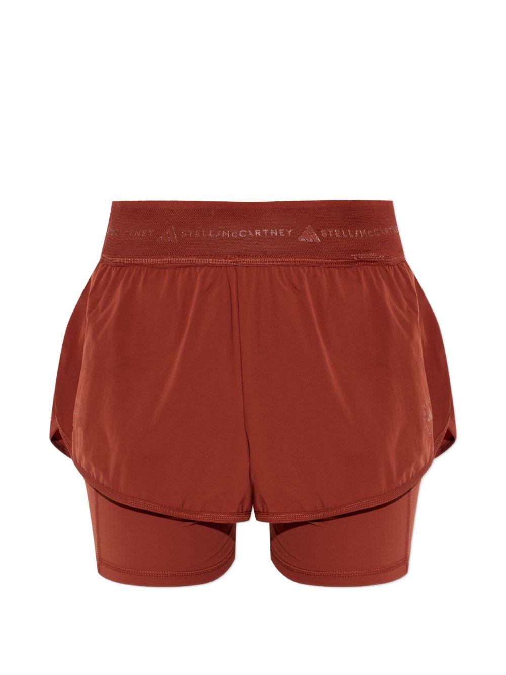 Shorts 2 in 1 con logo in rosso terracotta Adidas by Stella Mc Cartney - donna 