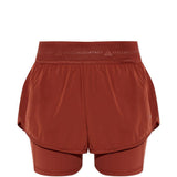 Shorts 2 in 1 con logo in rosso terracotta Adidas by Stella Mc Cartney - donna 