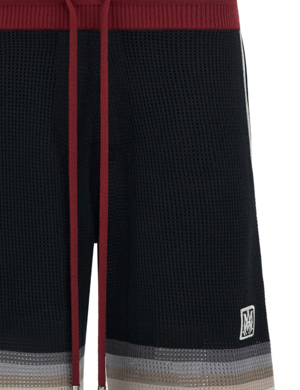 Shorts in maglia a righe in nero Amiri - uomo 