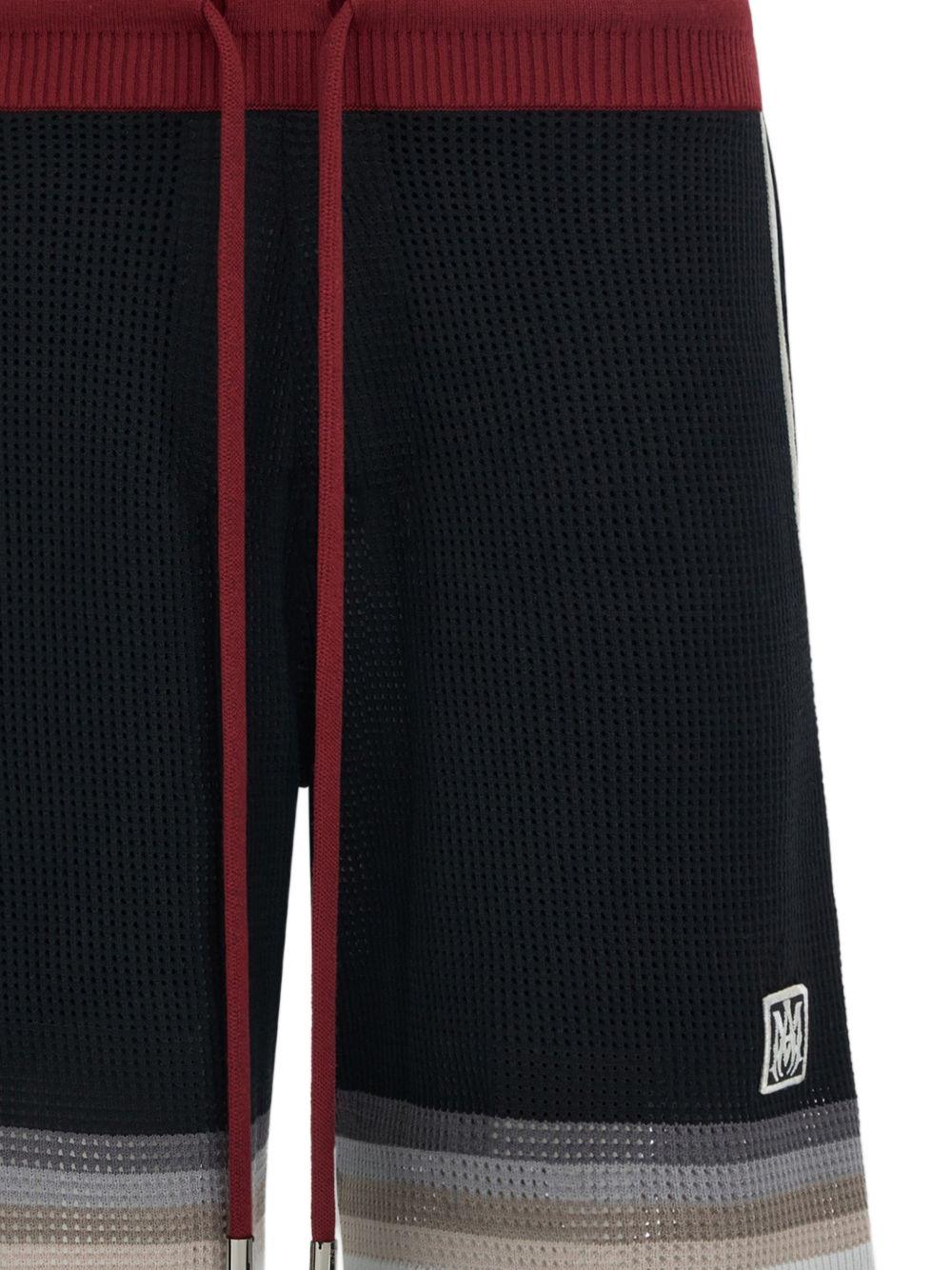 Shorts in maglia a righe in nero Amiri - uomo 