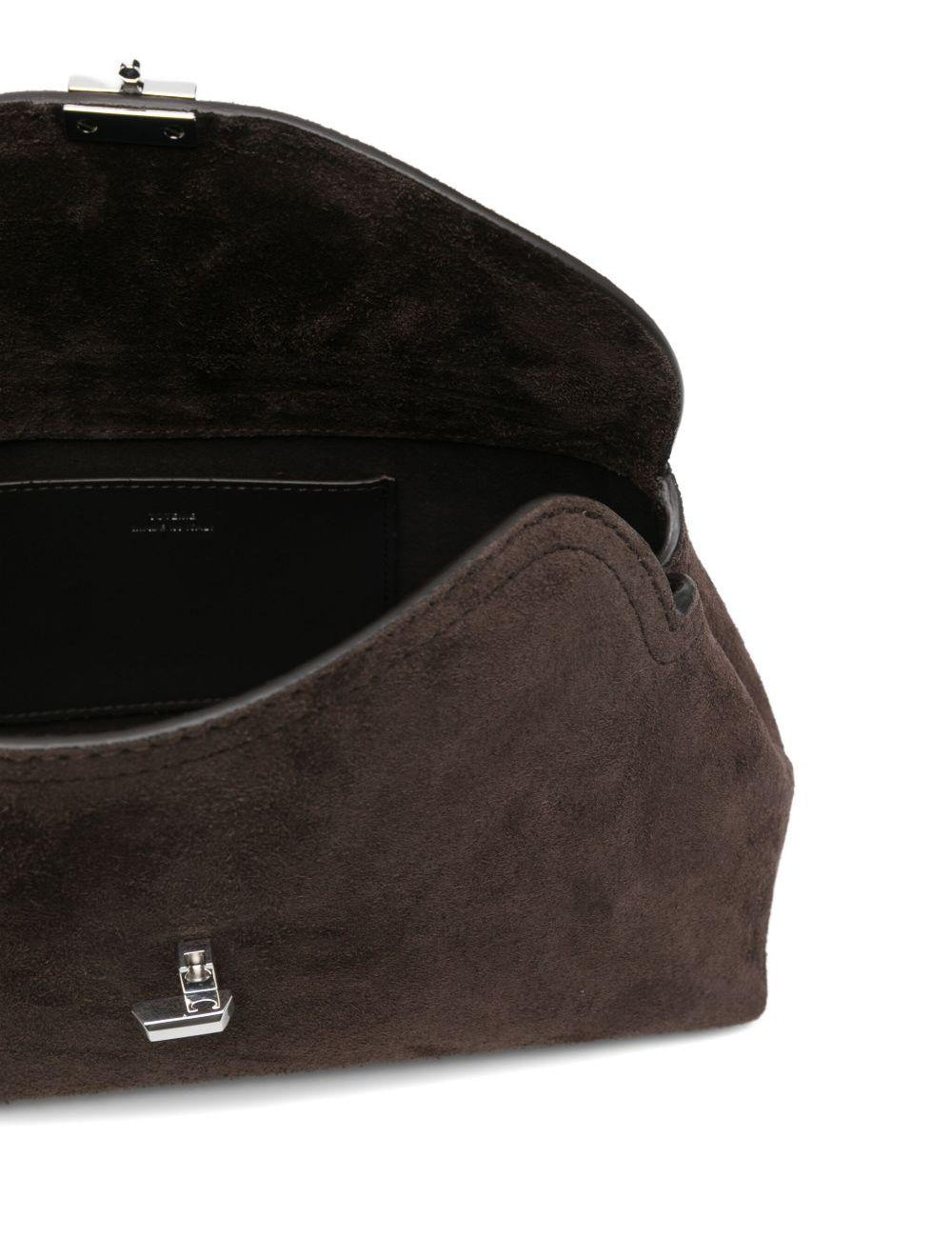 Clutch in suede con chiusura a T in marrone 