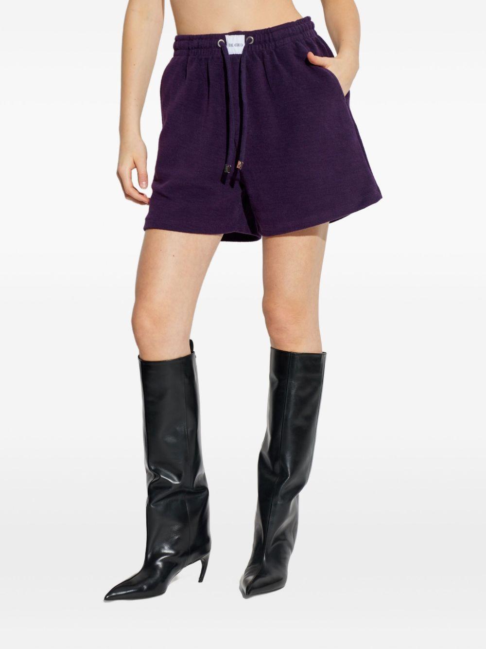 Shorts con coulisse e logo in viola The attico - donna 